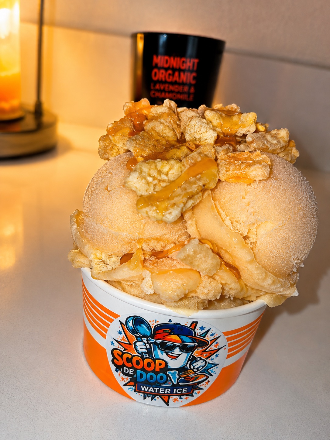 Scoop De Doo dessert cup with colorful toppings